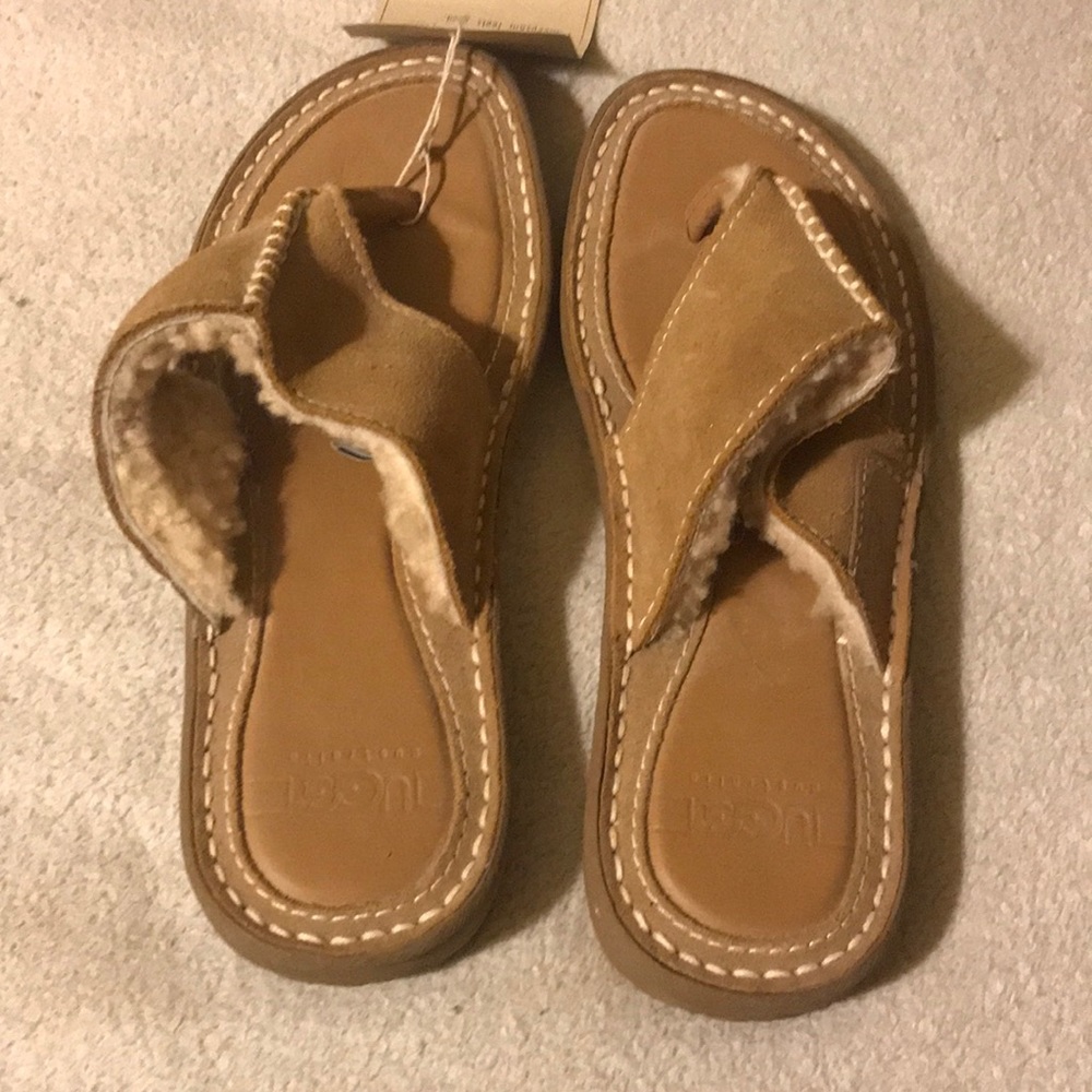 Ugg flip flops lined with fur